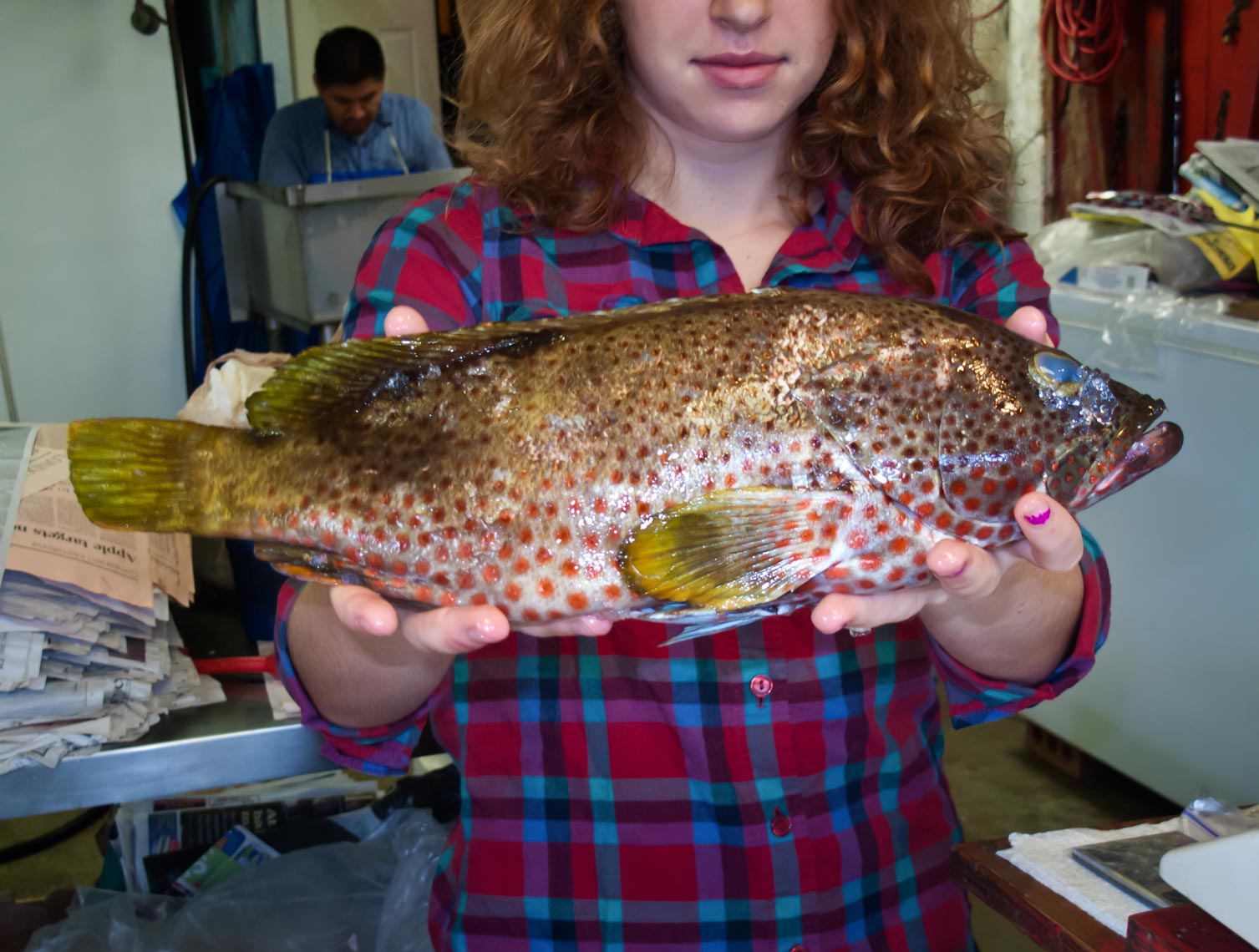 Woman holding a fish